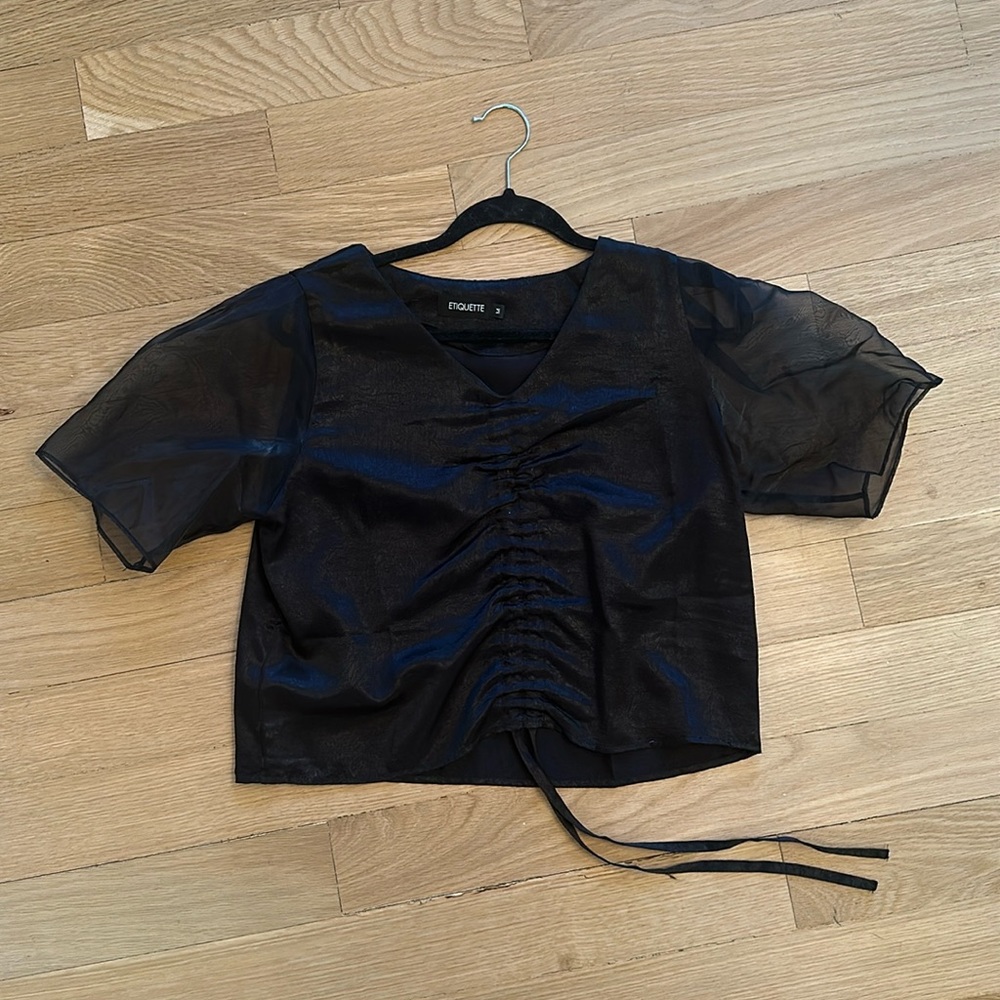 Black top, sheer sleeve, mid- scrunch shirt